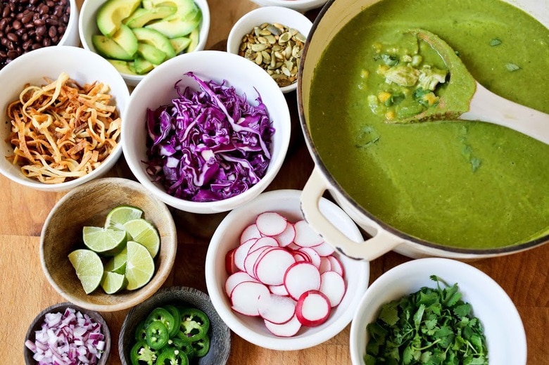 toppings for pozole verde in various bowls