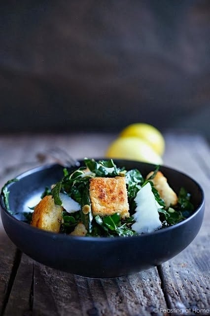 A simple healthy recipe for Kale Caesar Salad with Millet Croutons. The croutons are gluten free and fun to make! | www.feastingathome.com