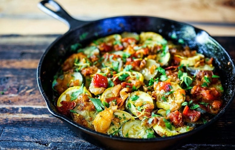 Baked Zucchini Tian- Baked Zucchini Tian- A baked zucchini dish with Middle Eastern flavors thats vegan and GF. Serve over Rice for a simple delicious meal. | www.feastingathome.com