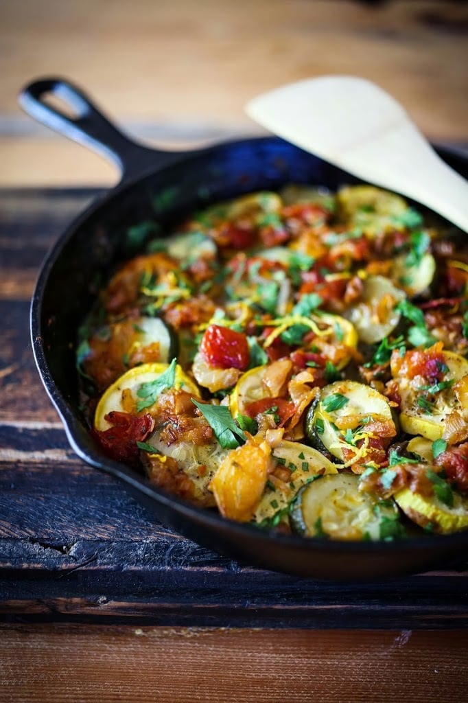 20 Delicious Zucchini Recipes: This Baked Zucchini Tian is seasoned with Middle Eastern Spices. Simple and flavorful this Zucchini side dish is healthy and vegan. 