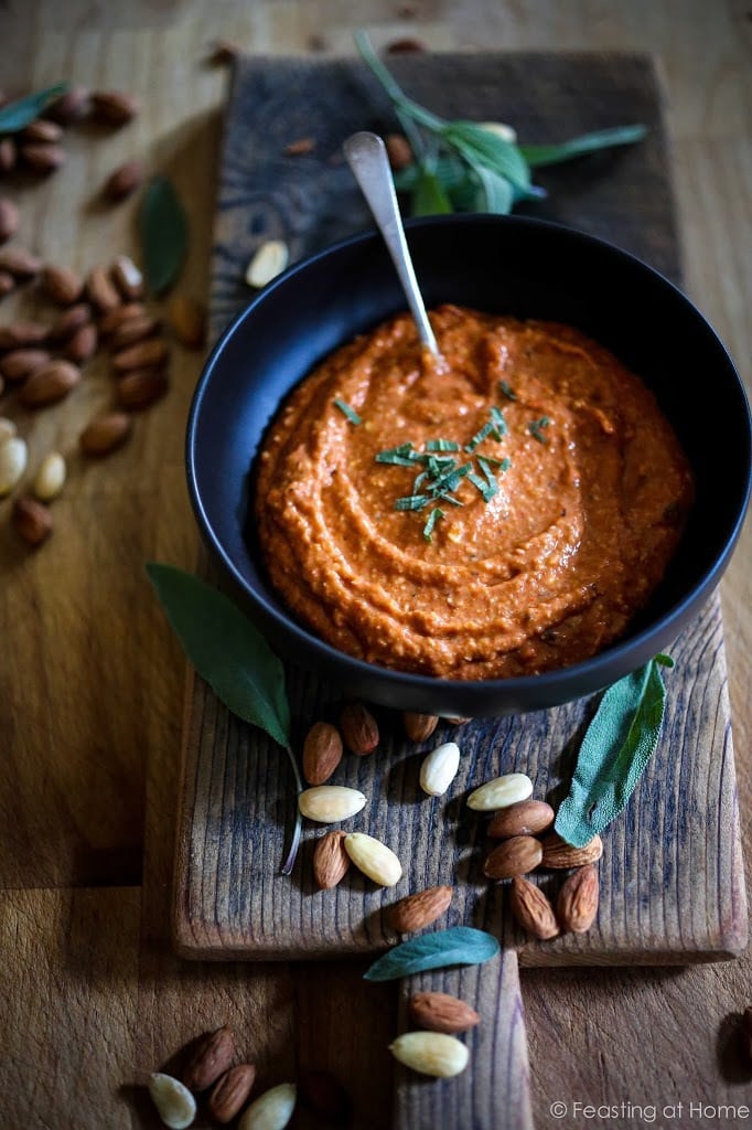 Flavorful Romesco Sauce! You'll find a million uses for this robust & flavorful Spanish condiment. Earthy, smoky and deep, it's made with simple ingredients you probably already have on hand. EASY, Vegan & Gluten-free #romesco #romescosauce #redpeppersauce #vegansauce #spanishrecipes #catalonian #spanishfood #easyromesco #plantbased #cleaneating #vegan #vegansauce 