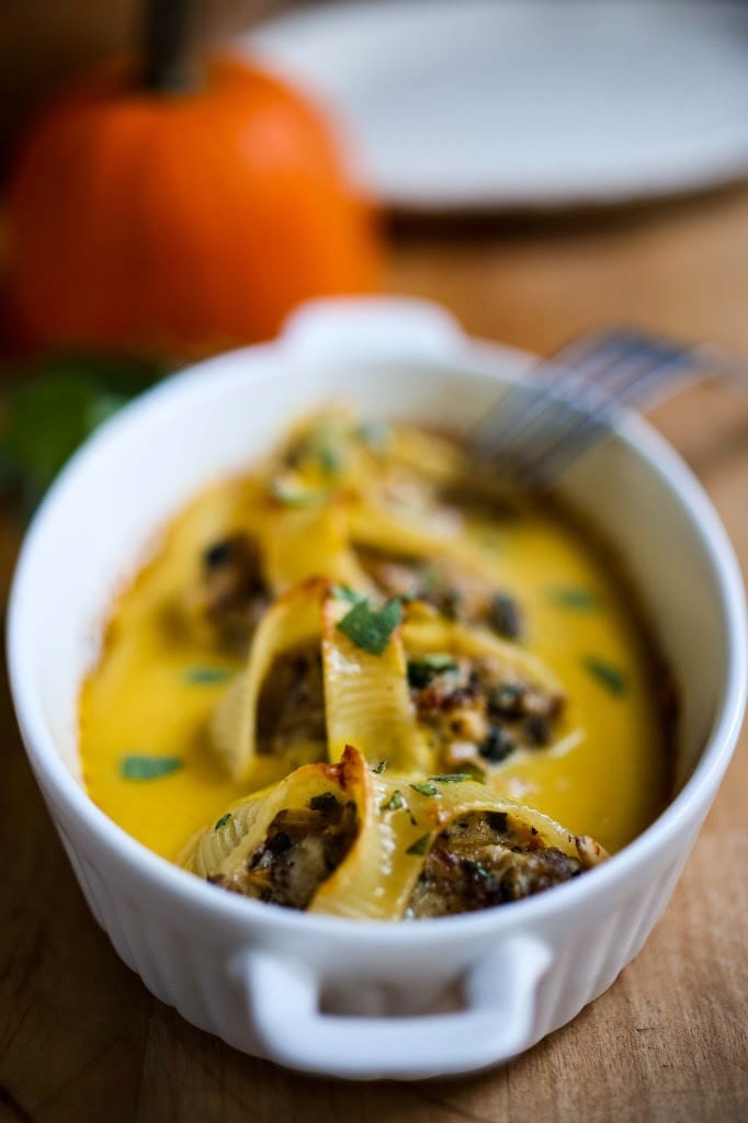 Stuffed Shells with Creamy Pumpkin Sauce- a delicious fall-inspired dinner that is comforting and warming.