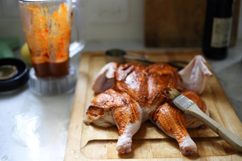 brush the chicken with the peri peri marinade