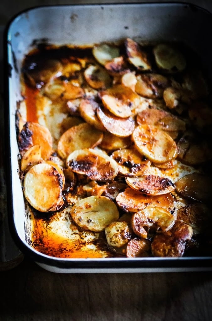 The potatoes are crispy and flavorful in the bottom of a pan
