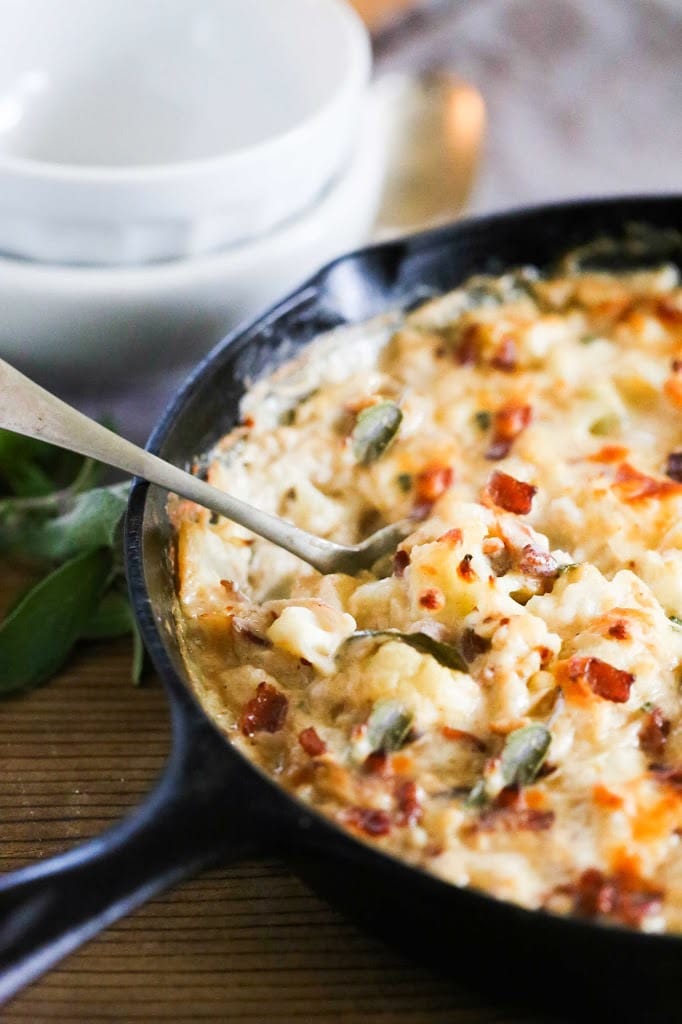 Cauliflower Gratin with garlic and sage, a delicious vegetarian side dish that is keto, low carb and gluten-free, perfect for the holiday table! #cauliflower #cauliflowergratin #lowcarbside #sidedish #lowcarb #keto #thanksgivingside #christmassidedish 