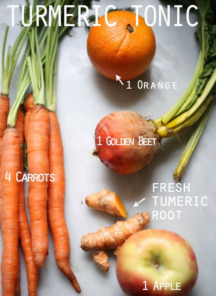 Turmeric Tonic | A fresh healthy juice made with fresh turmeric root, beets, apple and carrots to help detox and revitalize you! | www.feastingathome.com