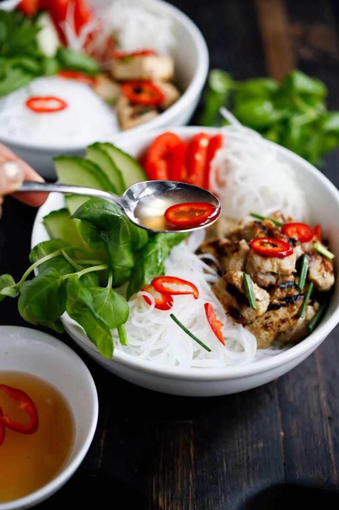 Flavorful Vietnamese Vermicelli w/ lemongrass chicken (or tofu) served over rice vermicelli noodles, w/ veggies and basil & flavorful Vietnamese dressing (Nuoc Cham) . Delicious!! | www.feastingathome.com