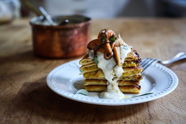 Savory Mushroom Crepes with Spaghetti Squash and Sage drizzled with Bechemal Sauce - a hearty cozy vegetarian dinner recipe, perfect for the colder months! #crepes #savorycrepes #mushroomcrepes #mushroomcrepes www.feastingathome.com