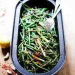 Charred Green beans with Bagna Cauda- an Italian sauce made with olive oil, minced anchovies, garlic, pepper and chili flakes- a flavorful side dish with lovely umami flavor.