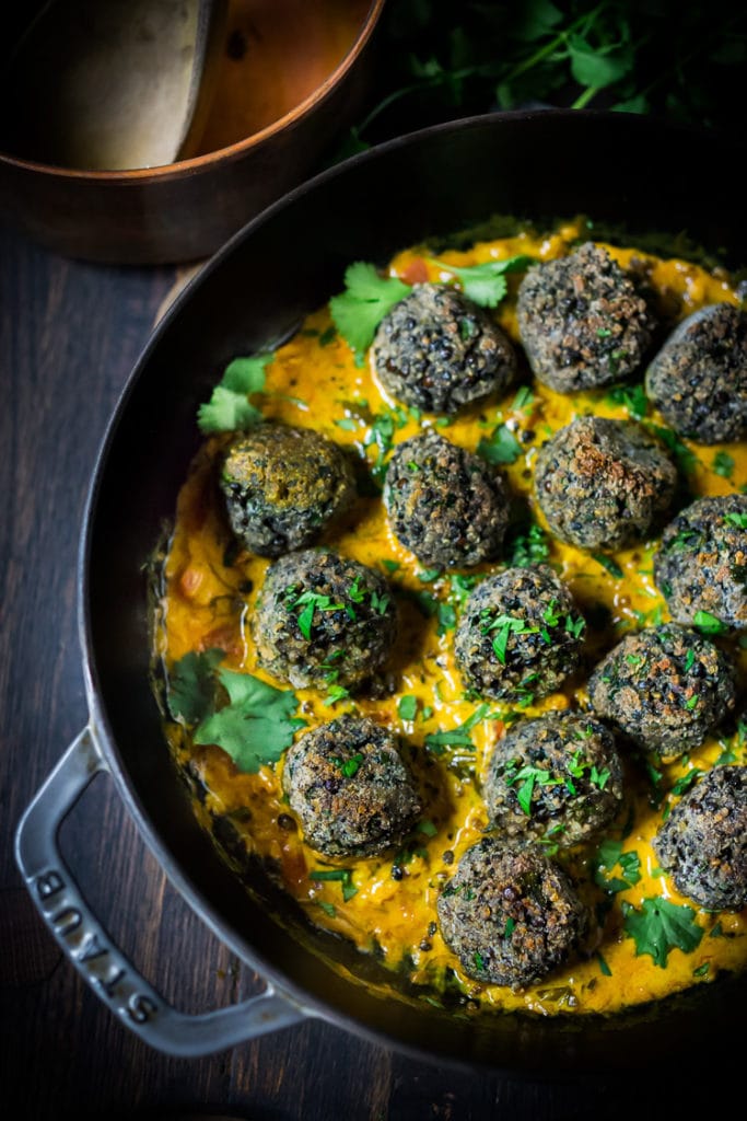 Vegan Lentil Meatballs with Indian Coconut Curry Sauce- a delicious healthy meal infused with fragrant Indian spices. Vegan and Gluten Free! #veganmeatballs #lentilmeatballs #vegan #indianmeatballs #veg