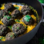 Vegan Lentil Meatballs with Indian Coconut Curry Sauce- a delicious healthy meal infused with fragrant Indian spices. Vegan and Gluten Free! #veganmeatballs #lentilmeatballs #vegan #indianmeatballs #veg