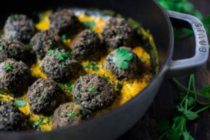Vegan Lentil Meatballs with Indian Coconut Curry Sauce- a delicious healthy meal infused with fragrant Indian spices. Vegan and Gluten Free! #veganmeatballs #lentilmeatballs #vegan #indianmeatballs #veg