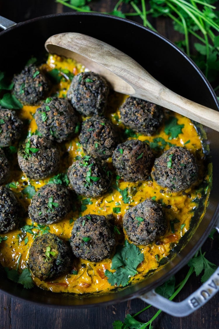 35 Delicious Indian Recipes to Make at Home | Vegan Lentil Meatballs with Indian Coconut Curry Sauce- a delicious healthy meal infused with fragrant Indian spices. Vegan and Gluten Free! #veganmeatballs #lentilmeatballs #vegan #indianmeatballs #veg