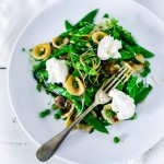 Orecchiette Pasta with fresh peas, asparagus and herbs in a very light carbonara sauce. 