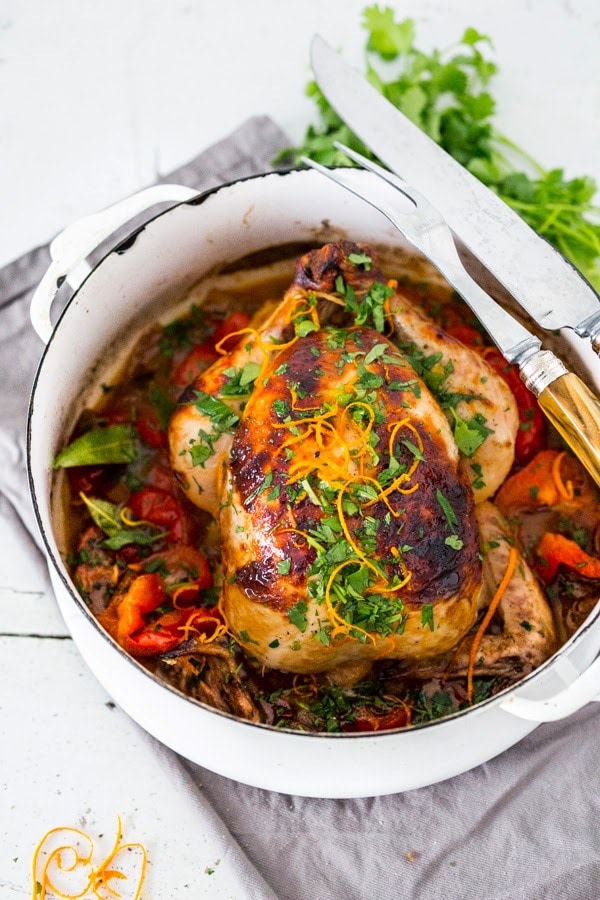 A delicious recipe for Cuban Mojo Chicken Roasted in the oven with a citrusy mojo marinade, and chile roasted yams. Make this on a sheet pan or in a Dutch Oven!