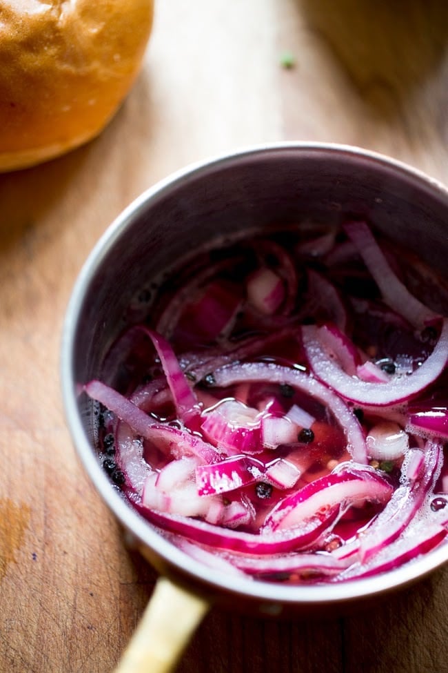 pickled red onions in a pot