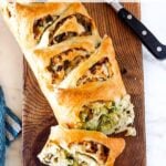 A simple delicious recipe for Crusty Cheesy Leek Bread to serve with your favorite soups and stews. #leeks #bread