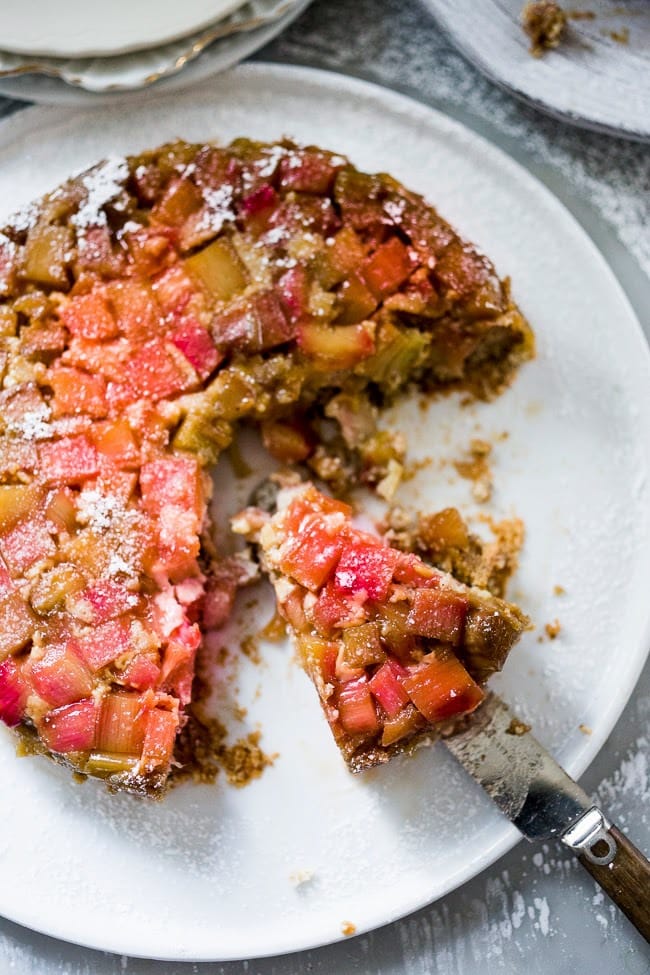 Upside Down Rhubarb Cake that is gluten free- made with Almond Flour. Deliciously addictive, perfect for Spring. | www.feastingathome.com #rhubarb #rhubardcake #upsidedowncake #rhubarbtart #glutenfreecake 