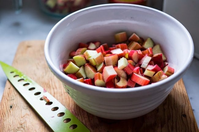 Upside Down Rhubarb Cake that is gluten free- made with Almond Flour. Deliciously addictive, perfect for Spring. | www.feastingathome.com #rhubarb #rhubardcake #upsidedowncake #rhubarbtart #glutenfreecake 