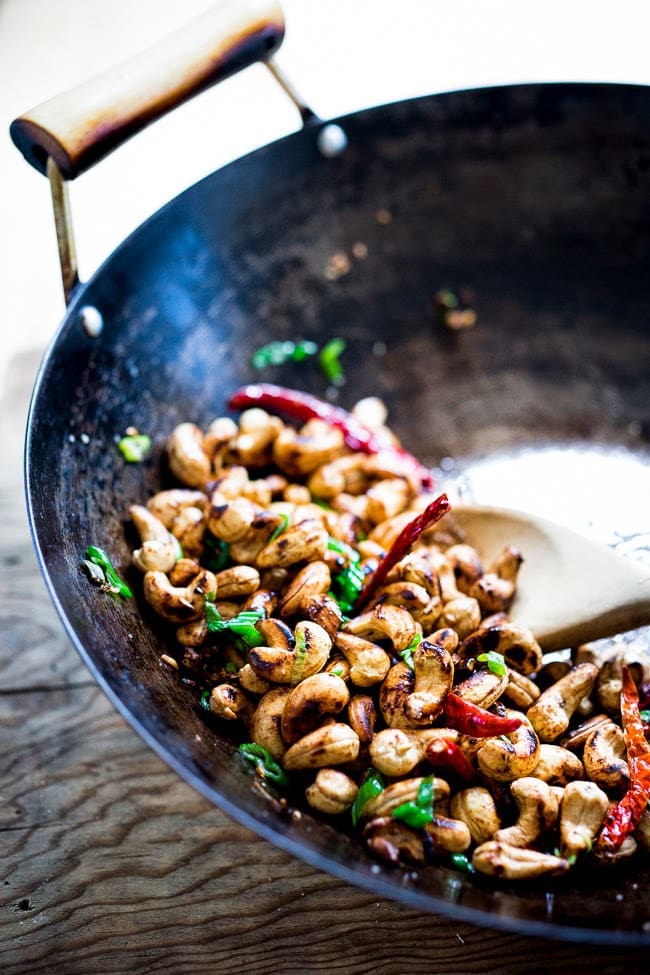 Wok-Seared Cashews with ginger, soy and sesame seeds- a quick and healthy vegan snack that is full of flavor and that can be made in 20 minutes! 