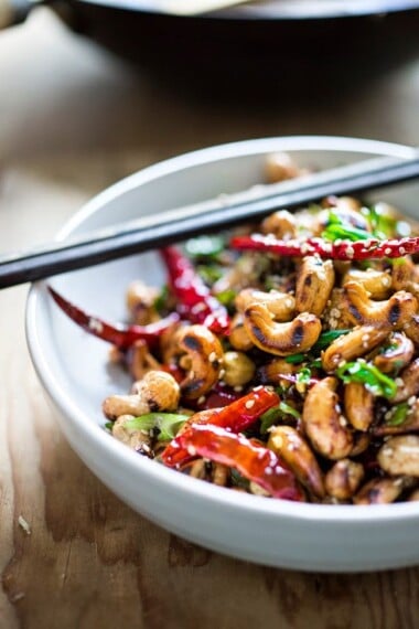 Wok-Seared Cashews with ginger, soy and sesame seeds- a quick and healthy vegan snack that is full of flavor and that can be made in 20 minutes! 