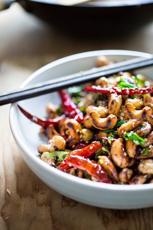 Wok-Seared Cashews with ginger, soy and sesame seeds- a quick and healthy vegan snack that is full of flavor and that can be made in 20 minutes! 