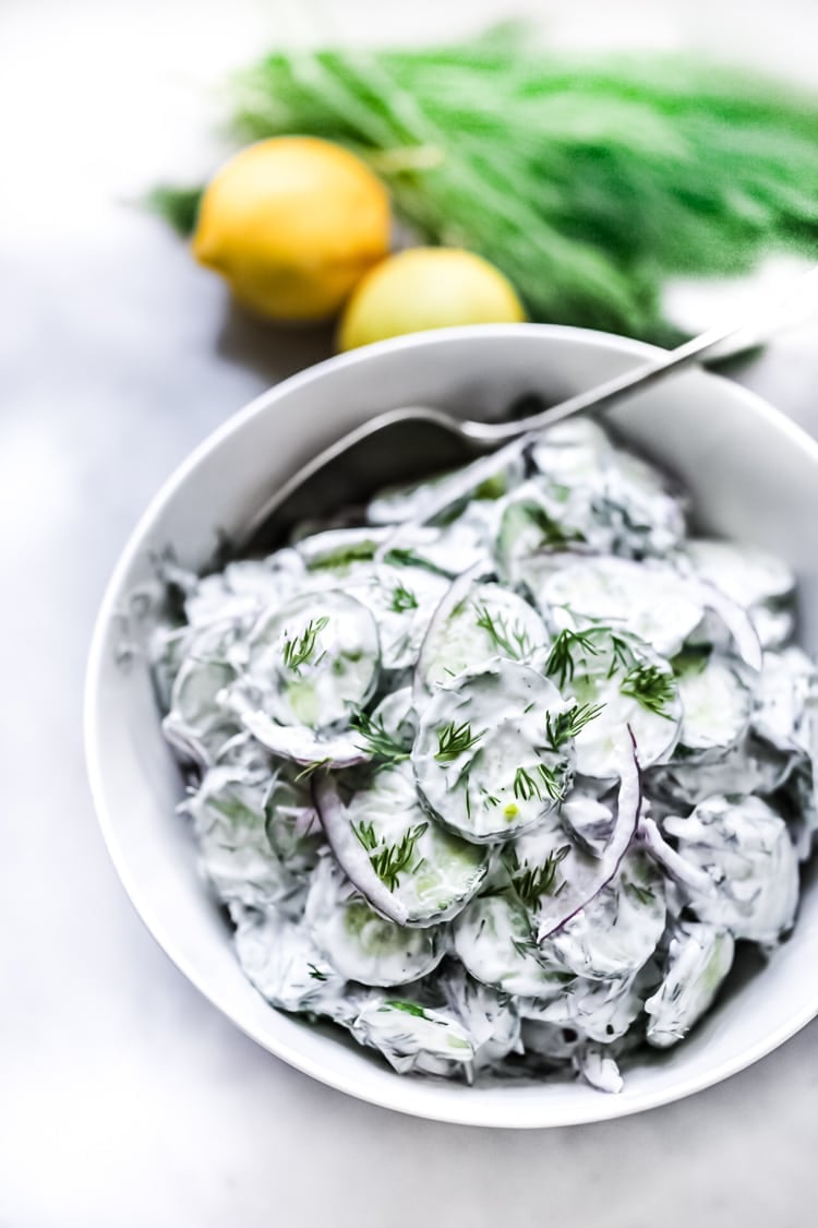 Creamy Turkish Cucumber Salad with fresh dill, mint, lemon and yogurt - the perfect side to Mediterranean-style grilled meats and fish | #cucumber #cucumbersalad #salad #creamycucumbersalad #cucumbers #turkish #turkishsalad | www.feastingathome.com