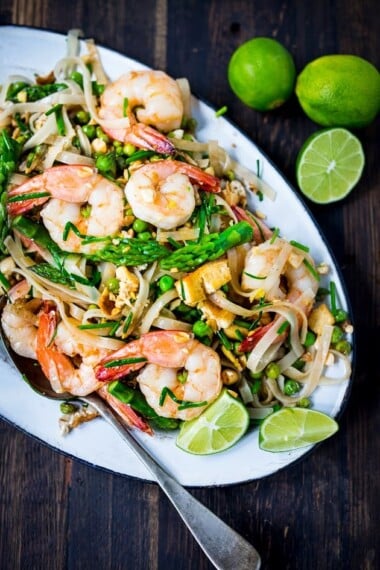An authentic recipe for Pad Thai made with spring veggies and authentic Thai ingredients, adapted from the Pok Pok Cookbook. #padthai #pokpok #shrimppadthai