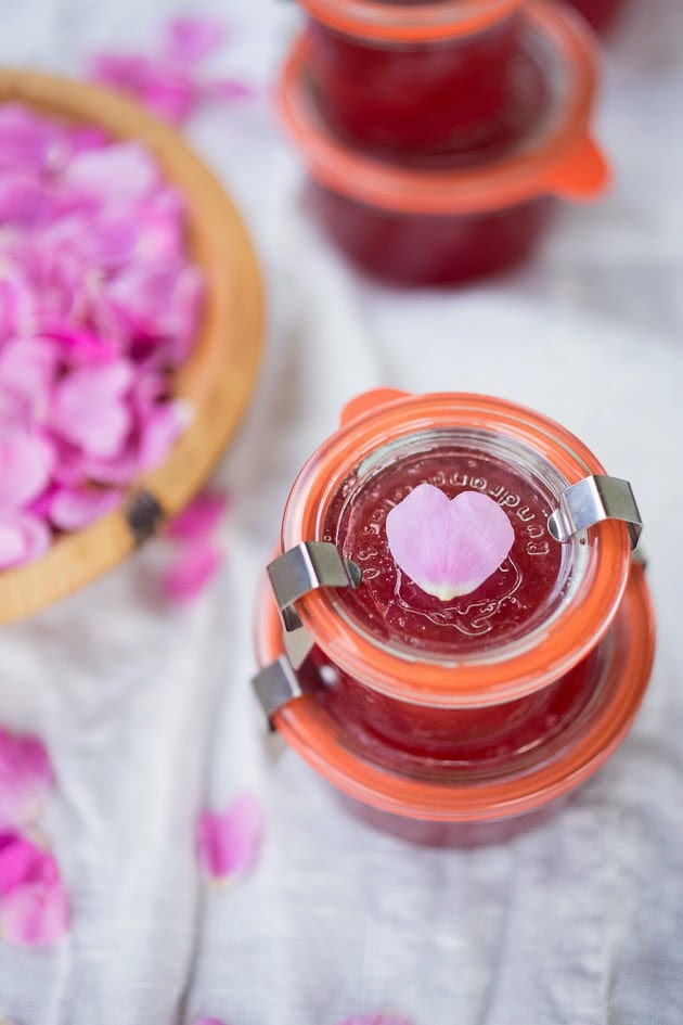 Homemade Rose Petal Jam- a simple delicious recipe made with wild rose petals, perfect on toast, scones or crepes, or spooned over ice-cream or cake. #rosepetaljam #rose #rosejam #roserecipes 