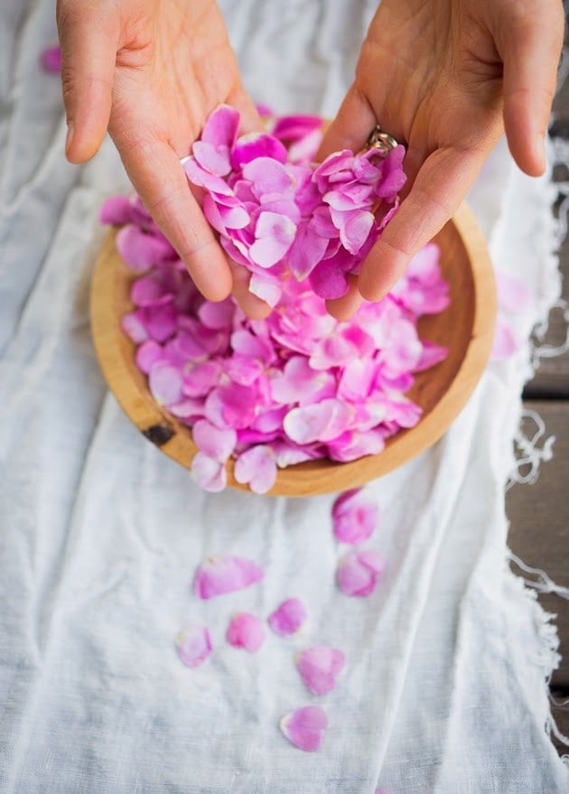 Homemade Rose Petal Jam- a simple delicious recipe made with wild rose petals, perfect on toast, scones or crepes, or spooned over ice-cream or cake. #rosepetaljam #rose #rosejam #roserecipes 