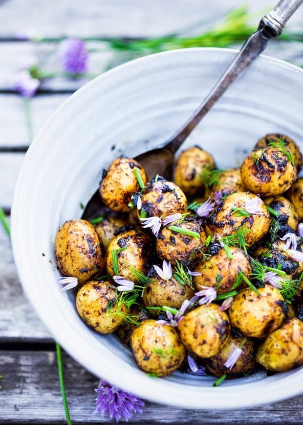 Grilled Potato Salad with a Black Garlic Dressing, a fun and delicious salad or side dish, perfect for summer BBQS. Vegan. 