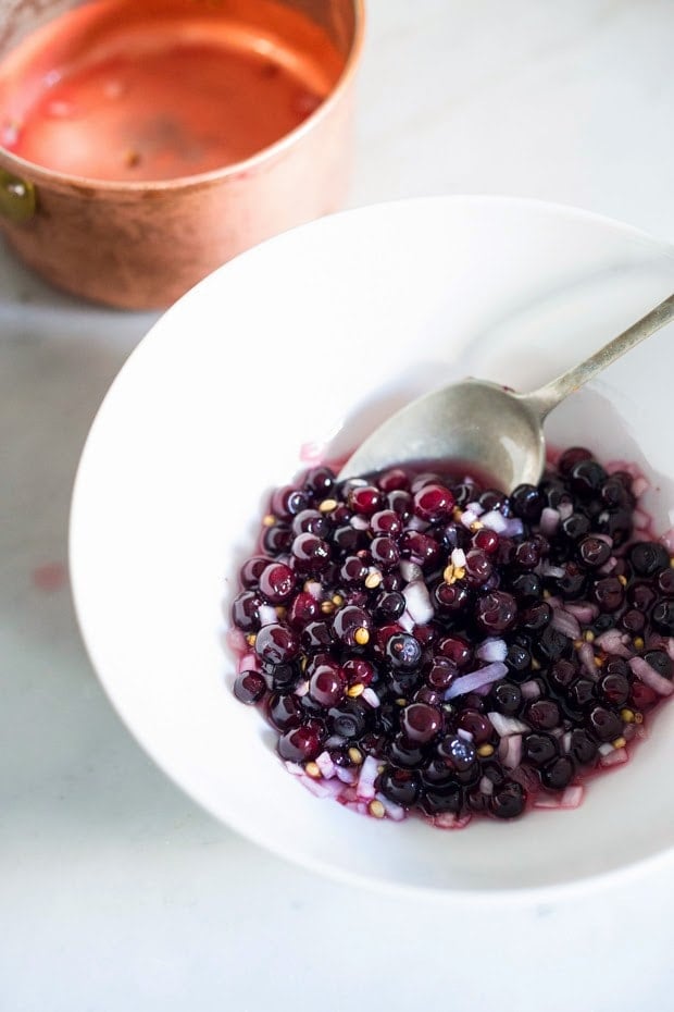 Pickled huckleberries make this Grilled Huckleberry Salmon recipe a winner. Served atop Grilled salmon, this is a true Northwest inspired summer meal. Gluten free, healthy!