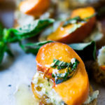 Peach Brushetta with goat cheese, basil and infused honey...a simple delicious appetizer you can make in minutes!| #peach #peachrecipes #bruschetta #peachbruschetta www.feastingathome.com
