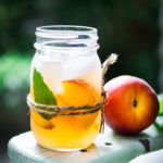 Simple Refreshing Peach Sangria Recipe ...a delicious summer drink made with white wine and Elder flower liquor (or syrup) that can be made ahead. Perfect for a crowd!
