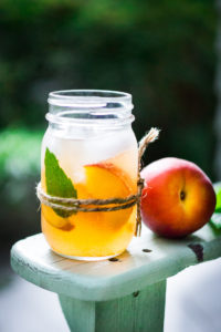 Simple Refreshing Peach Sangria Recipe ...a delicious summer drink made with white wine and Elder flower liquor (or syrup) that can be made ahead. Perfect for a crowd!