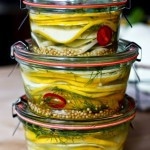 Preserve summer's bounty with these quick pickled summer squash and zucchini! Add to sandwiches and burgers! #pickled #pickledzucchini