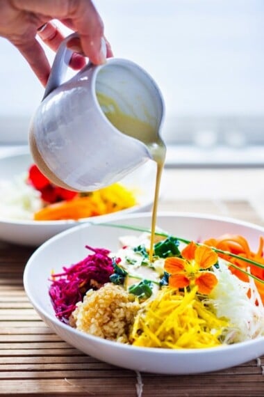 Vegan Sunshine Bowl w/ fresh crunchy veggies- grated beets, carrots, kohlrabi, sunchokes, radish & jicama with nutty brown rice and Creamy Sunshine Sauce!  Vegan and GF! | #veganbowl