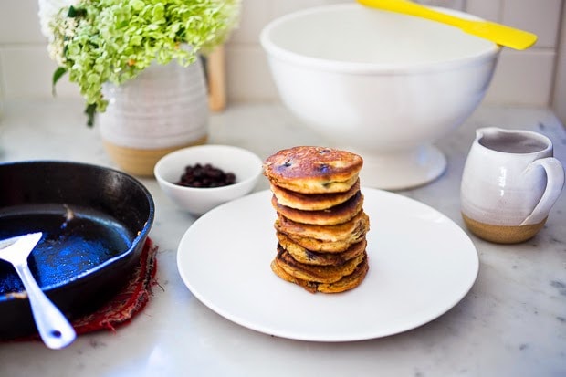 EASY Almond Flour Pancakes with fresh huckleberries (or sub your favorite summer berry) - a delicious, low-carb, gluten-free, paleo recipe for our favorite breakfast! #pancakes #almondflour #paleopanckes #huckleberries