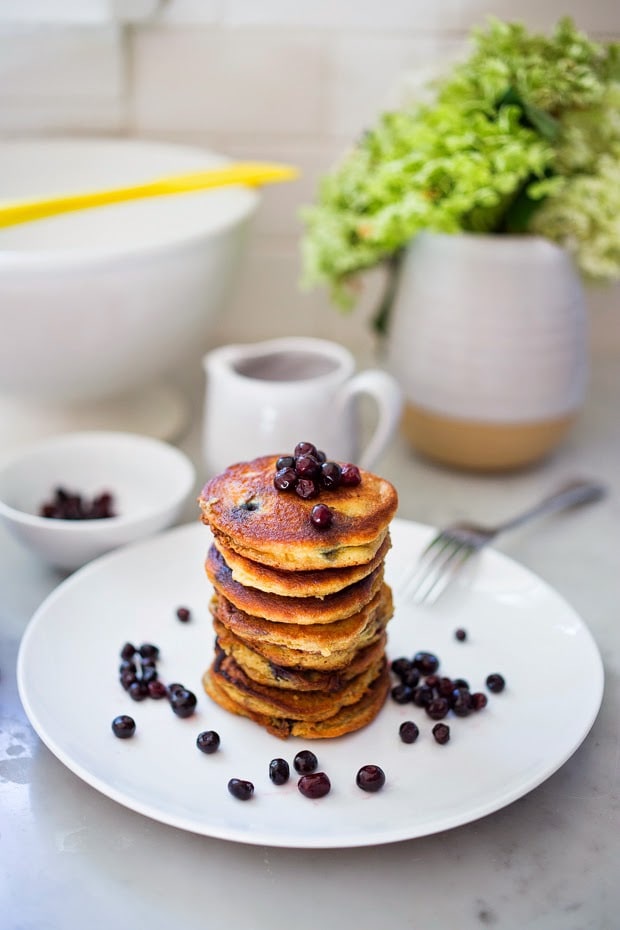 EASY Almond Flour Pancakes with fresh huckleberries (or sub your favorite summer berry) - a delicious, low-carb, gluten-free, paleo recipe for our favorite breakfast! #pancakes #almondflour #paleopanckes #huckleberries 