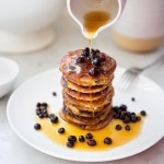 EASY Almond Flour Pancakes with fresh huckleberries (or sub your favorite summer berry) - a delicious, low-carb, gluten-free, paleo recipe for our favorite breakfast! #pancakes #almondflour #paleopanckes #huckleberries