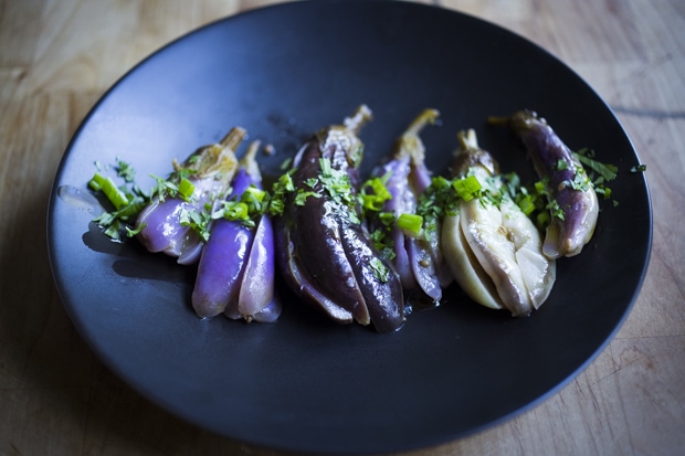 Moroccan pickled eggplant with garlic, coriander and cilantro. Drizzled with olive oil they make the perfect addition to any meal. | www.feastingathome.com.com