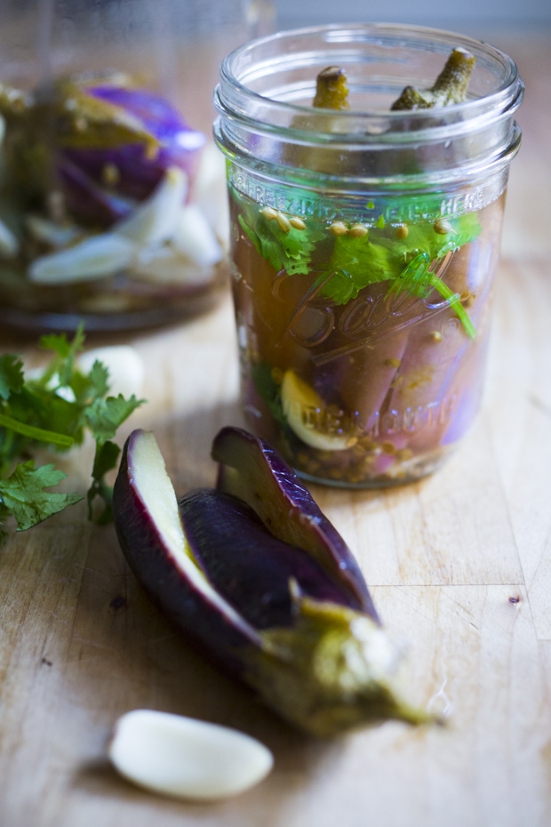 Moroccan pickled eggplant with garlic, coriander and cilantro. Drizzled with olive oil they make the perfect addition to any meal. | www.feastingathome.com.com