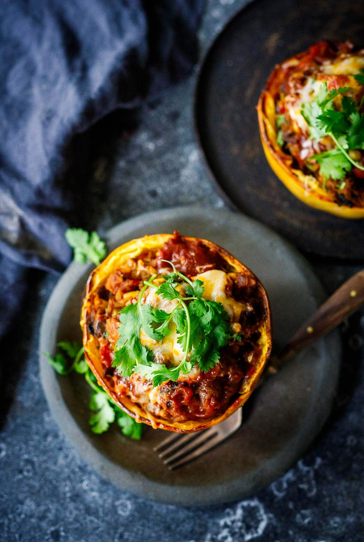 Stuffed Spaghetti Squash baked, with cilantro on top. 