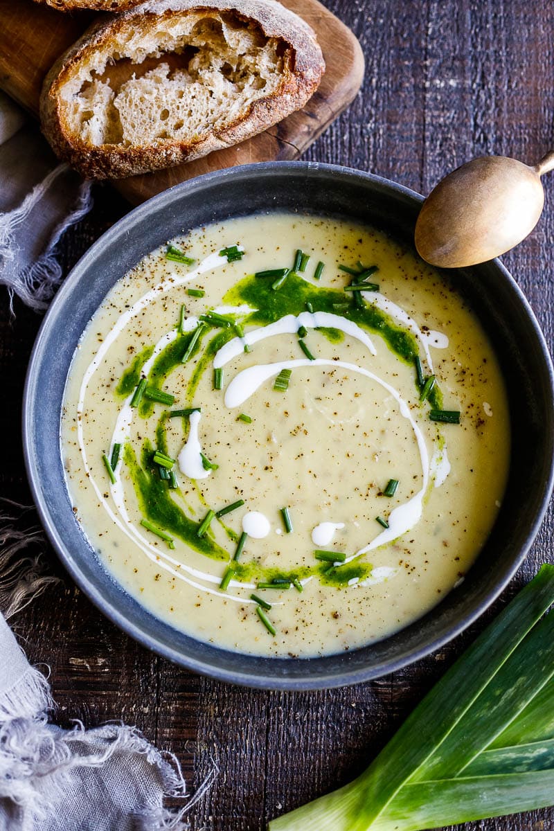 This simple healthy recipe for Potato Leek Soup is deceiving flavorful. A nourishing, soul-satisfying meal in under 30 minutes, made with simple ingredients. Vegan adaptable. With a video!