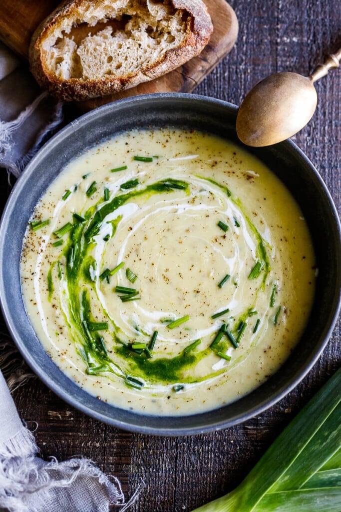 This simple healthy recipe for Potato Leek Soup is deceiving flavorful. A nourishing, soul-satisfying meal in under 30 minutes, made with simple ingredients. Vegan adaptable. With a video!