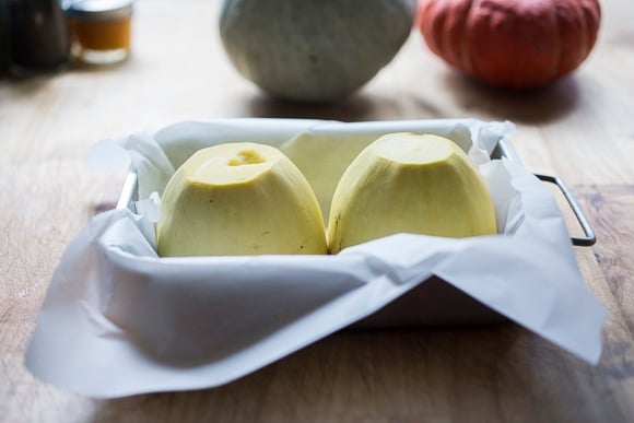 Placing on a parchment lined pan. 