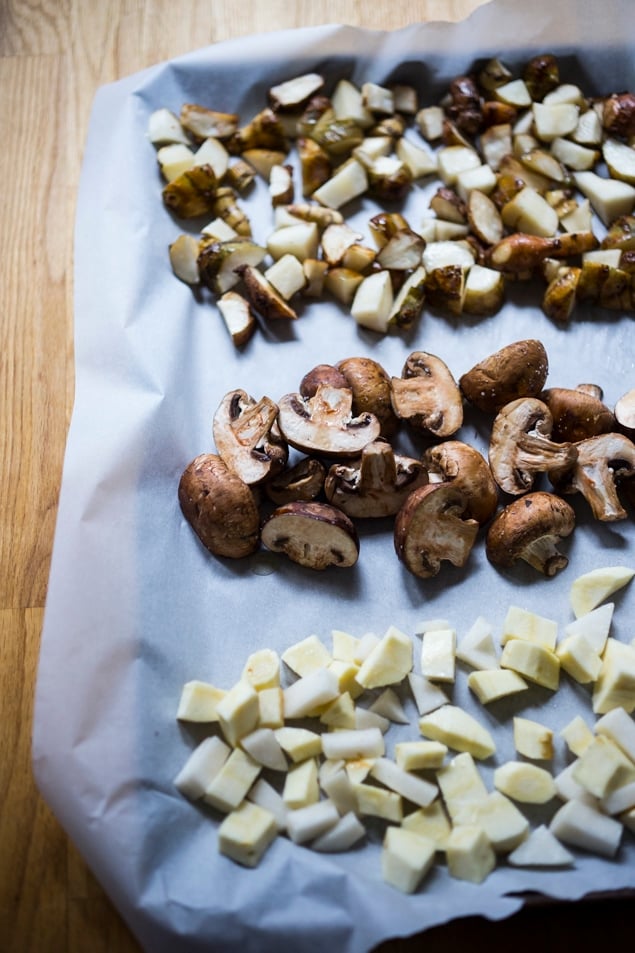 This Roasted Sunchoke and Black Nile Barley Bowl, with kale, mushrooms and parsnips & a Zaatar spiced Tahini Sauce is perfect for fall! Vegan and Nutritious!