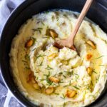 These Garlic Mashed Potatoes are simply heavenly! Creamy, flavorful and easy to make, they are the ultimate side dish to any meal! Easy enough for weeknight dinners, elegant enough for the holiday table. 