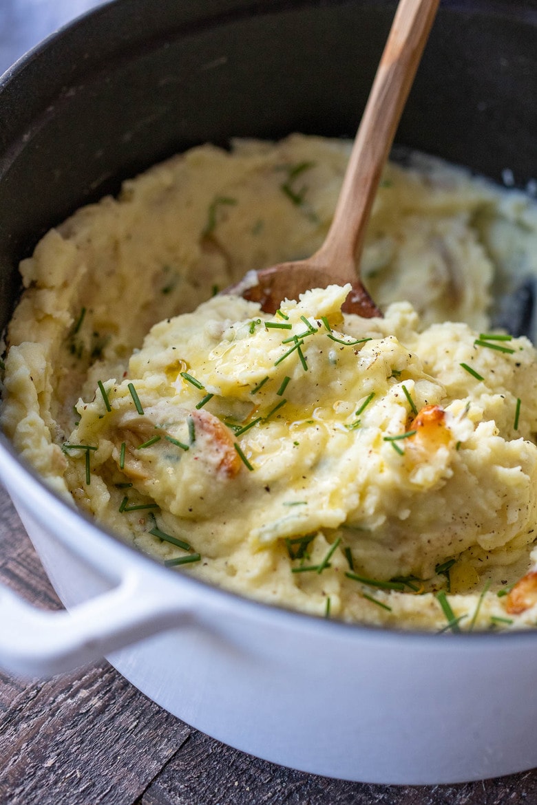 Roasted Garlic Mashed Potatoes with a whisper of horseradish (optional) - creamy, delicious and full of flavor! Vegan Adaptable! 