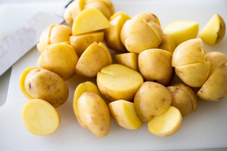 cutting potatoes for mashed potatoes